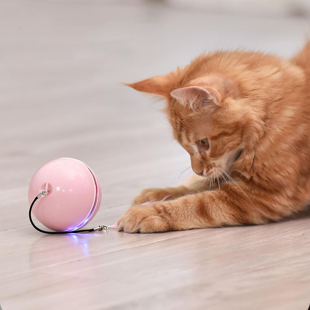 Smart Interactive Cat Toy Colorful LED Self Rotating Ball Bell and Feather Toys USB Rechargeable Cat Kitten Ball Toy Cat Exercise Ball with Feather Bell and Catnip